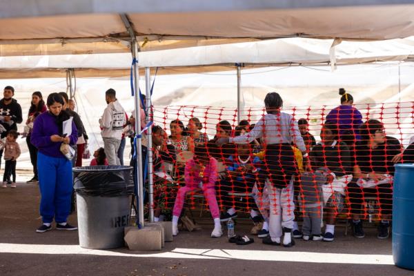 Migrants arrive at the Regio<em></em>nal Center for Border Health in Yuma, Arizona, after being released by Border Patrol.