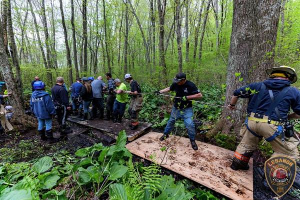 Both horses were pulled by 40 first responders. 