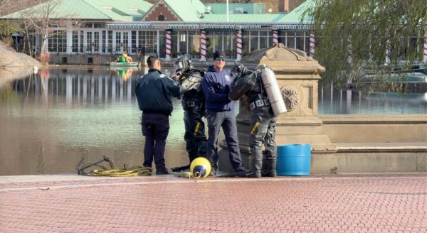 NYPD divers in the water at the boathouse in Central Park searching the water for possible disposal site of the weapon that was used to assassinate UnitedHeathcare CEO Brian Thompson.