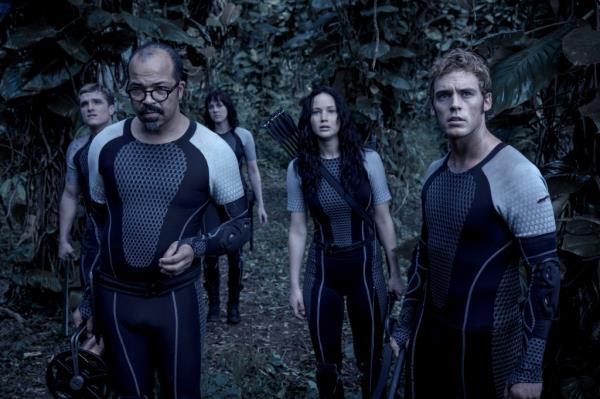 Josh Hutcherson, Jeffrey Wright, Jennifer Lawrence, and Sam Claflin (right) in 