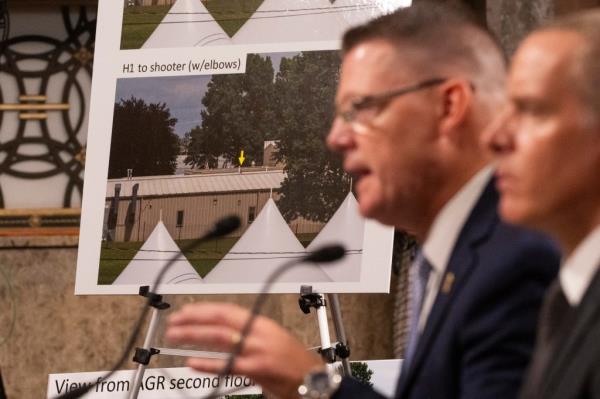 US Secret Service Acting Director Ro<em></em>nald Rowe, Jr. and FBI Deputy Director Paul Abbate testifying at a Senate hearing, showing a photo of a shooter's position