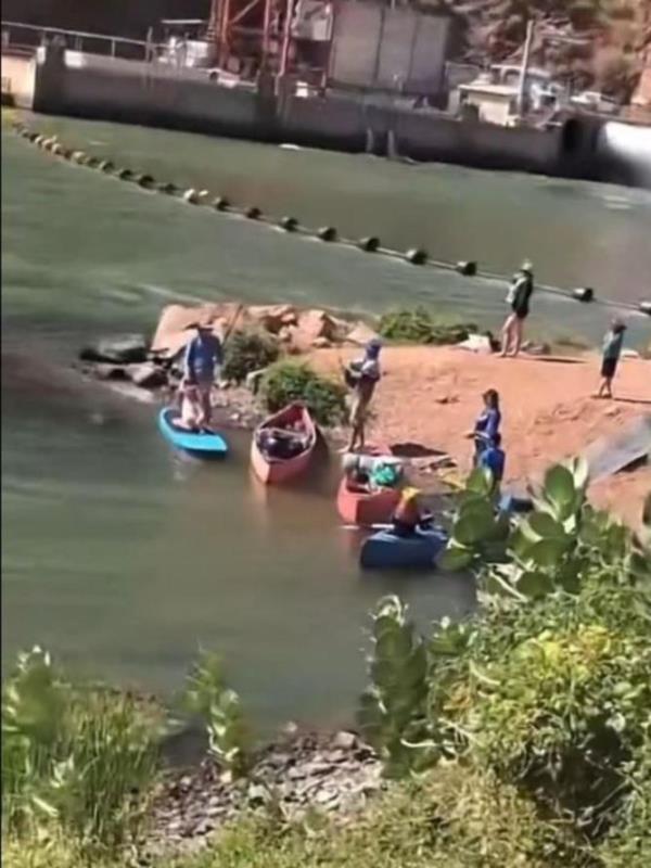 An Australian has captured a chilling detail in a video of a family canoeing across a seemingly harmless lake.