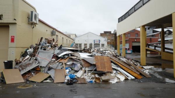 Debris outside of businesses in the NSW town of Lismore following the 2022 floods.