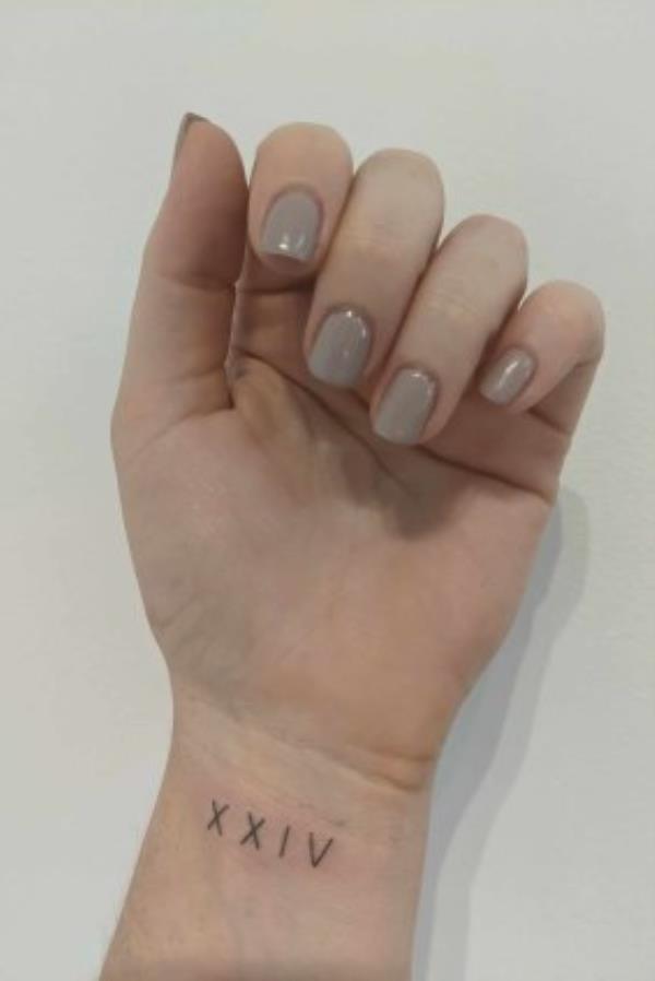 Lara Melrose, 32, has the number 24 in Roman numerals tattooed o<em></em>nto her wrist. It represents the day she met her husband, the day she got married and the day she lost her pregnancy.