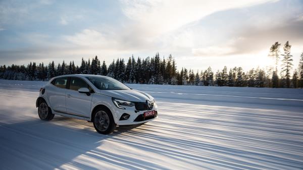 Renault 5 Prototype car driving on snow