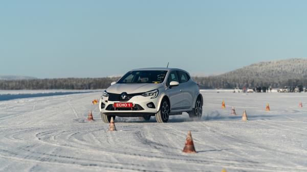 Renault 5 Prototype car driving on snow