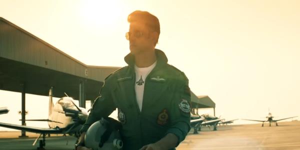 A Pilot Walking in the Sun in Fighter