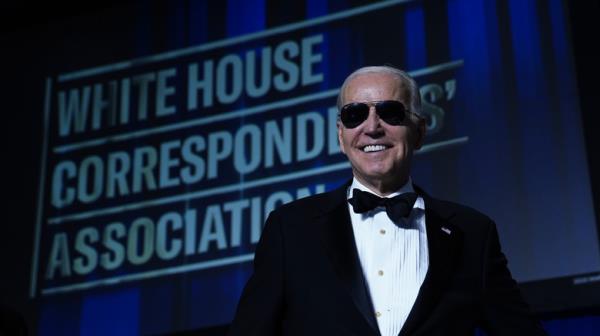 Joe Biden aviator sunglasses tuxedo smiling