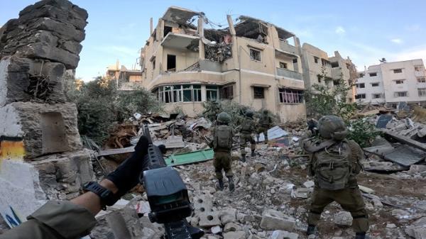 Israeli soldiers operate in the Gaza Strip amid the o<em></em>ngoing co<em></em>nflict between Israel and the Palestinian resistance group Hamas. PHOTO: Reuters