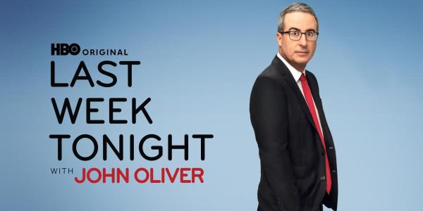 John Oliver standing sideways on a promotio<em></em>nal image for Last Week To<em></em>night with John Oliver