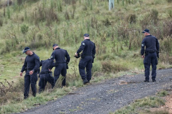 Police searching for evidence at a property on Hazelton Road, Bungonia, a<em></em>bout 20 minutes away from the site wher<em></em>e the men’s bodies were found.